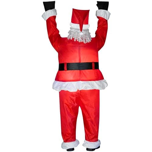 An inflatable Santa figure positioned at a roof edge