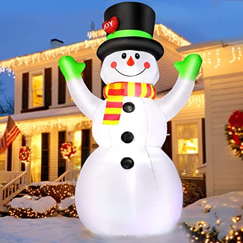 A lit inflatable decoration on a lawn
