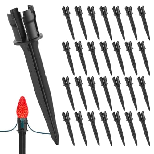 Ground stakes pushed into a lawn